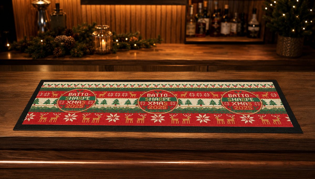 Custom Christmas stubby coolers with a matching festive knitted-jumper bar runner